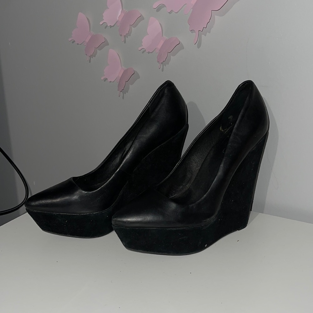 Pointed toe Aldo wedge heels.